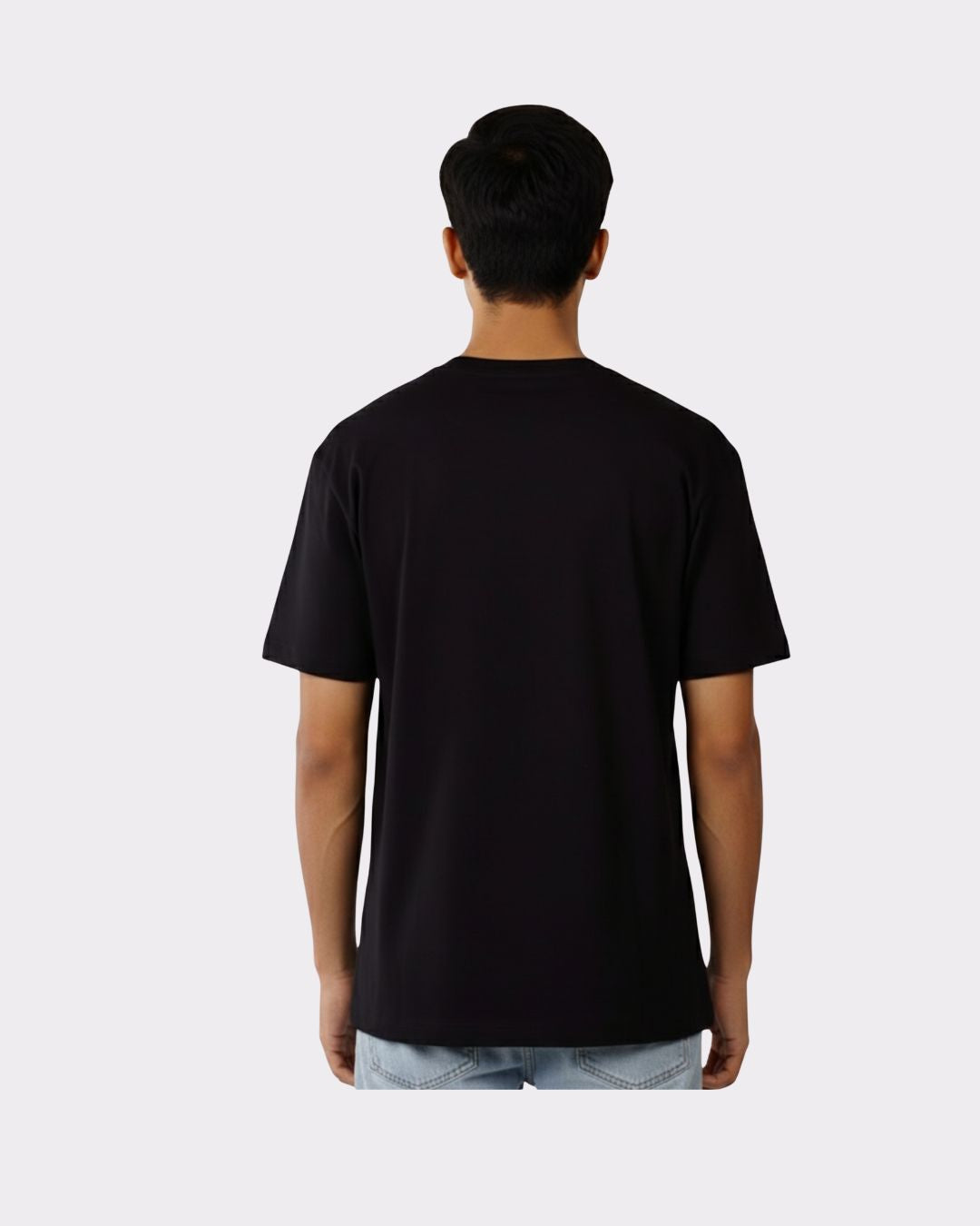 Back view of a man wearing black Physician Oversized Tshirt For Men from Bandar Baant Collections