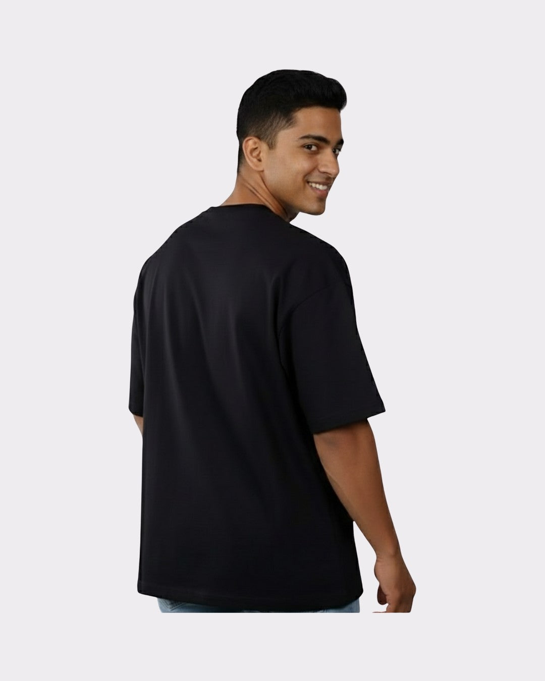 Man wearing black Physician Oversized Tshirt For Men from Bandar Baant Collections shown from the back