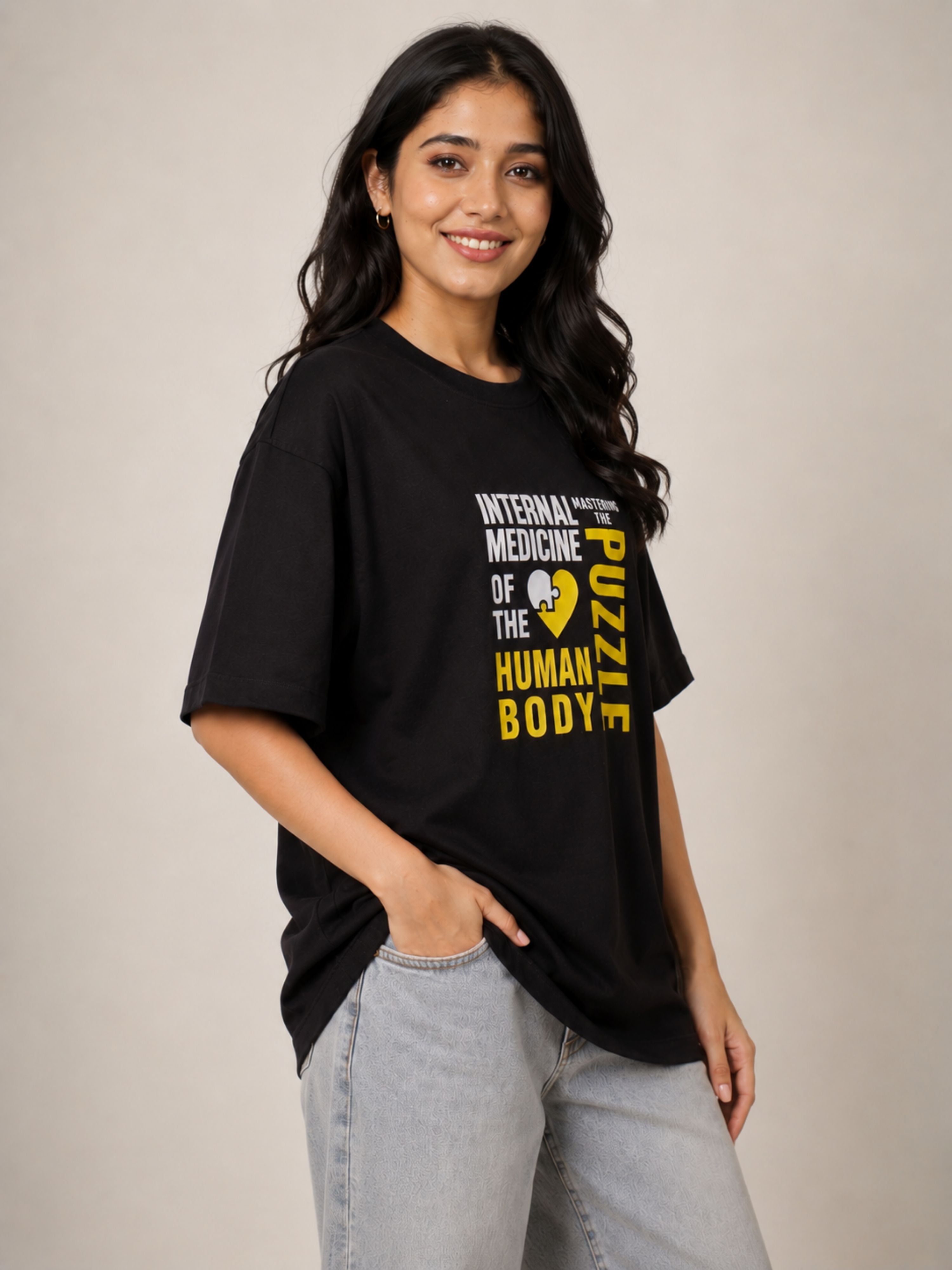 Black oversized fit Physician T-shirt For Women with yellow and white medical text design