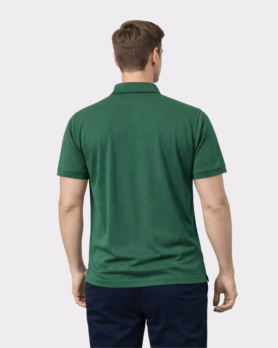 Back view of a man wearing a green Premium Regular Fit Polo T-shirt For Men by Bandar Baant Collections