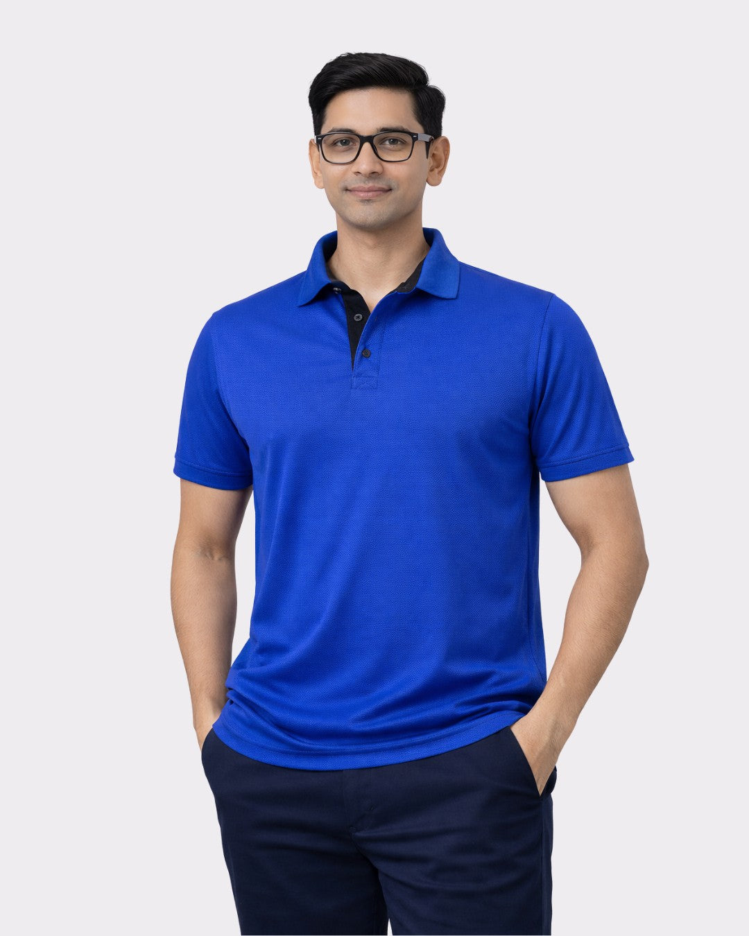 Premium Regular Fit Polo T-shirt For Men in blue worn by model with glasses and navy pants