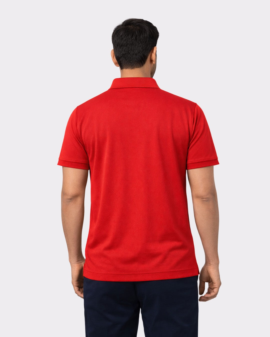 Back view of a man wearing a red Premium Regular Fit Polo T-shirt For Men by Bandar Baant Collections