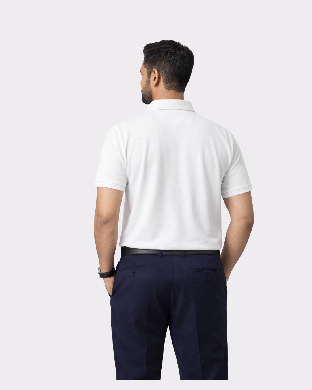 Back view of man wearing Premium Cotton Matty Polo T-Shirt for Men in white oversized fit by Bandar Baant Collections