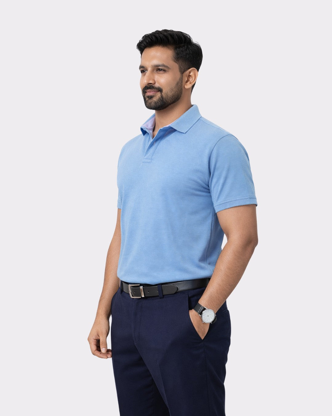 Man wearing Premium Cotton Matty Polo T-Shirt for Men in light blue from Bandar Baant Collections