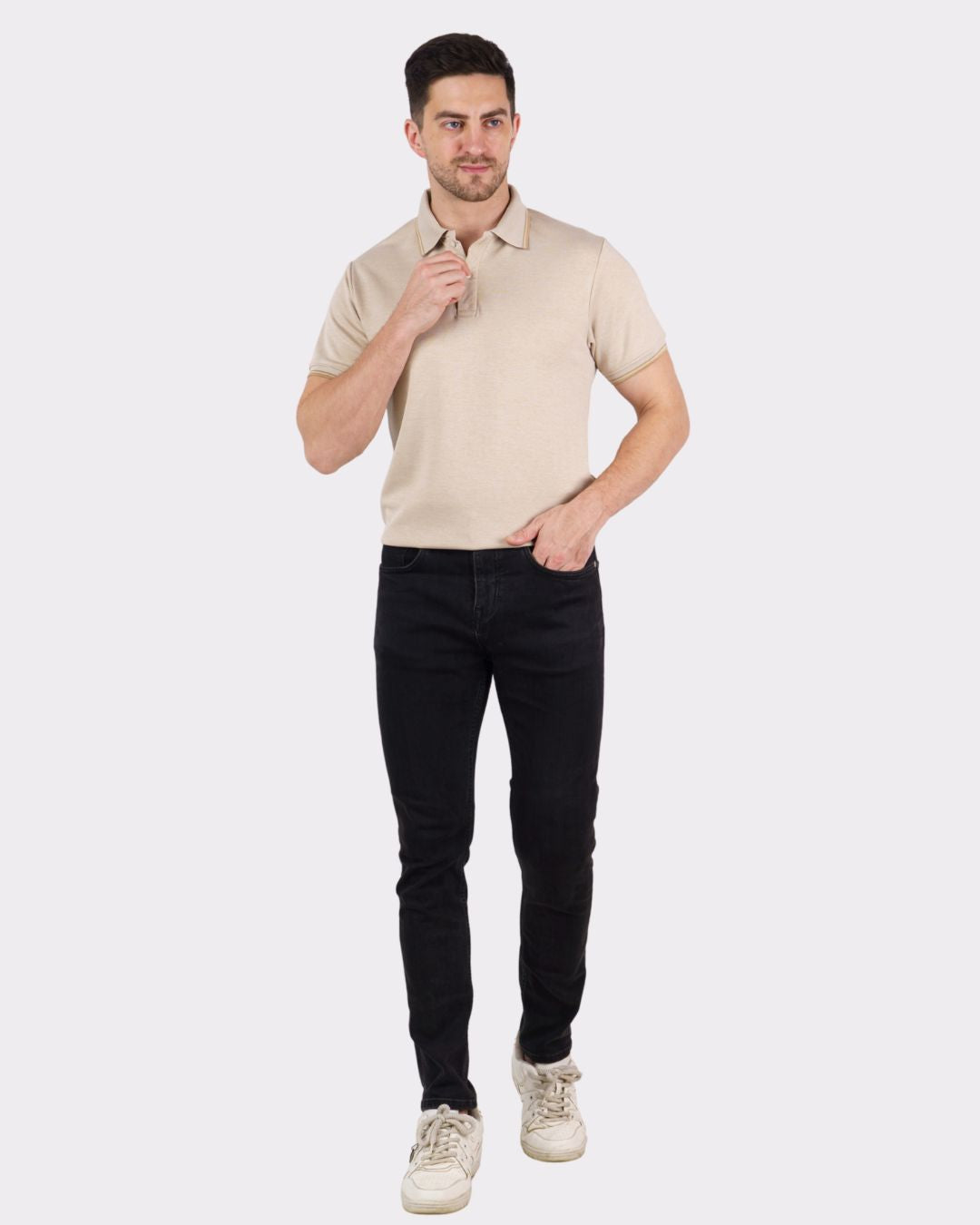 Men's beige oversized fit Premium Polo T-Shirt for Men paired with black jeans and white sneakers