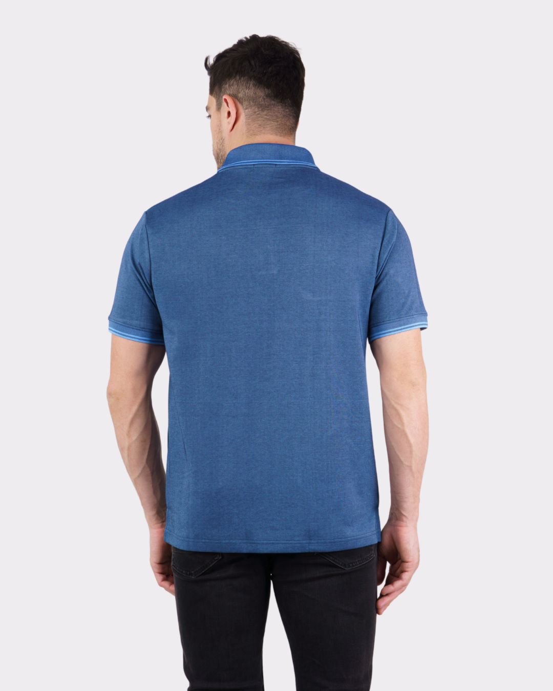 Back view of man wearing blue oversized fit Premium Polo T-Shirt for Men from Bandar Baant Collections