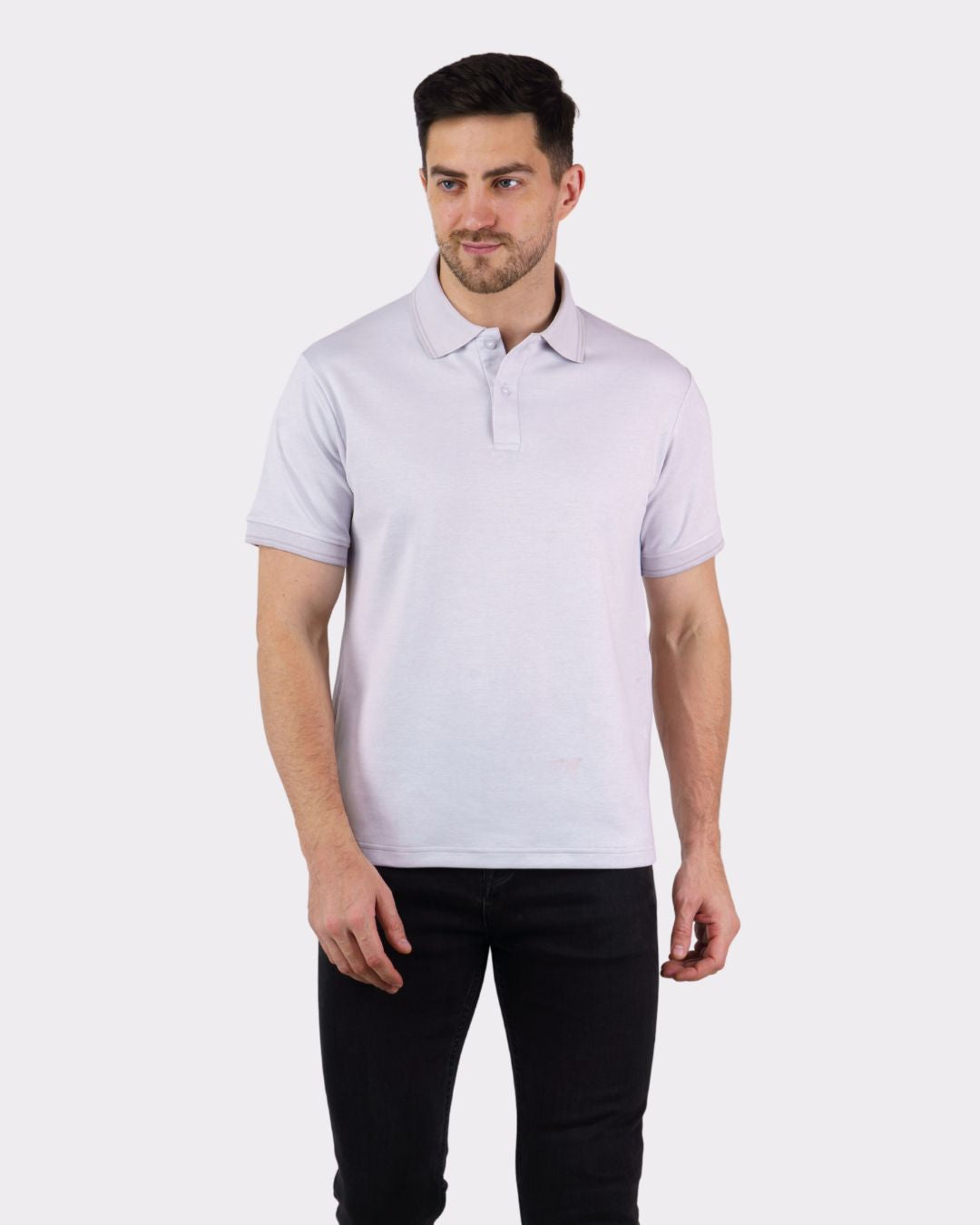 Premium Polo T-Shirt for Men by Bandar Baant Collections oversized fit in light color worn by male model