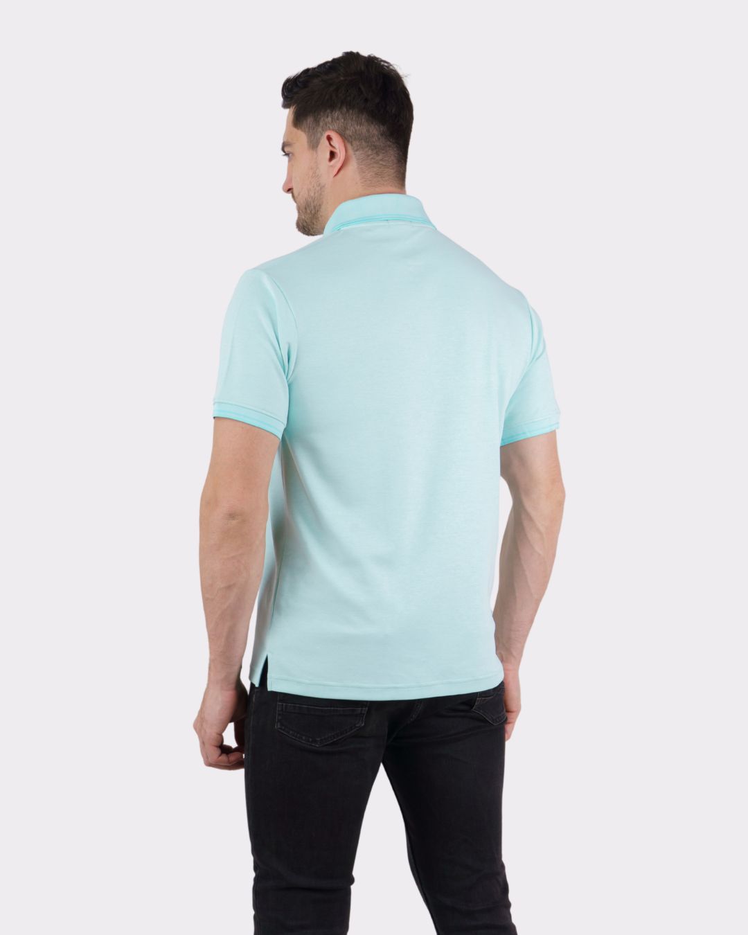Back view of a man wearing a light blue Premium Polo T-Shirt for Men by Bandar Baant Collections