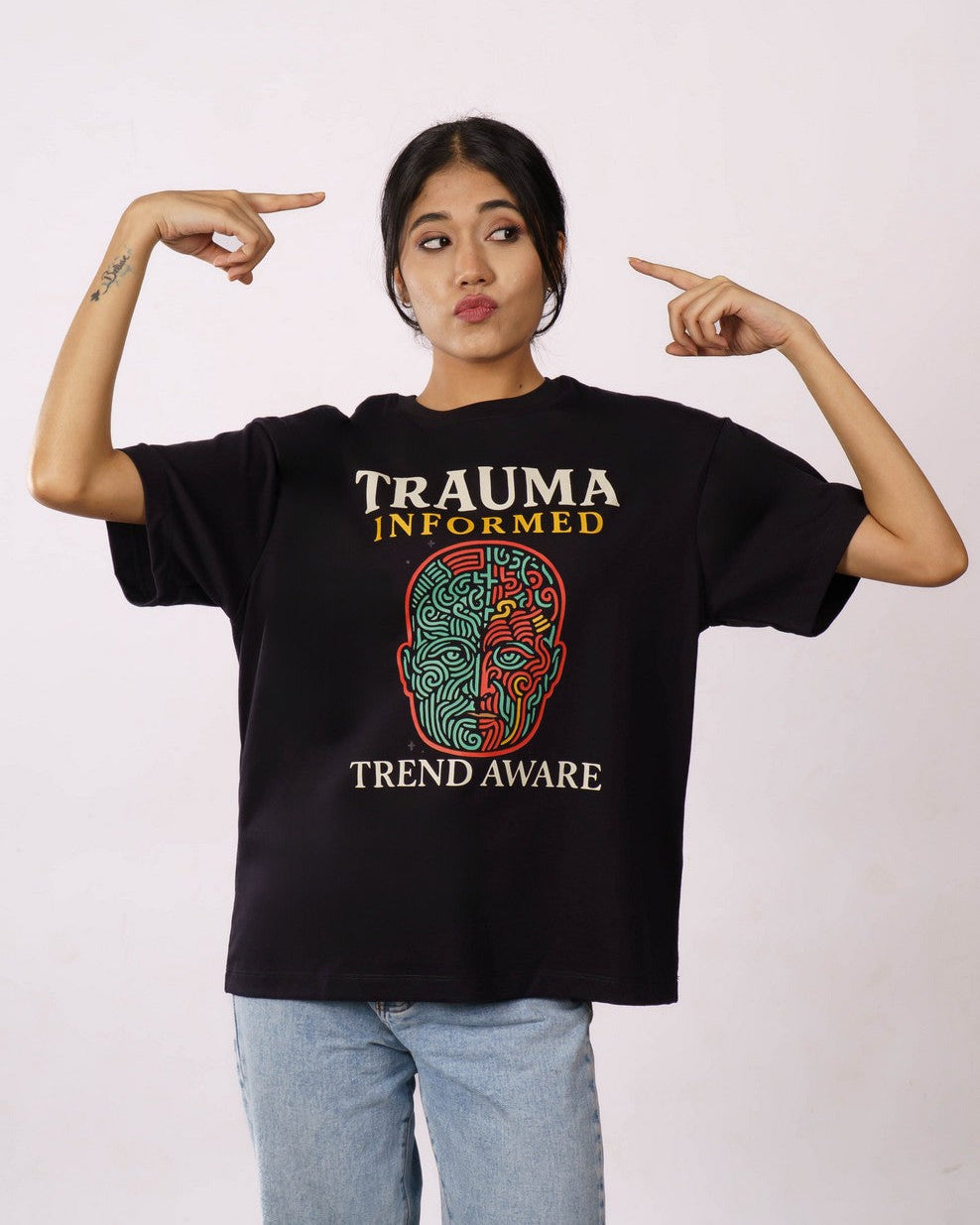 Black oversized fit printed T-shirt for women with trauma informed graphic design by Bandar Baant Collections
