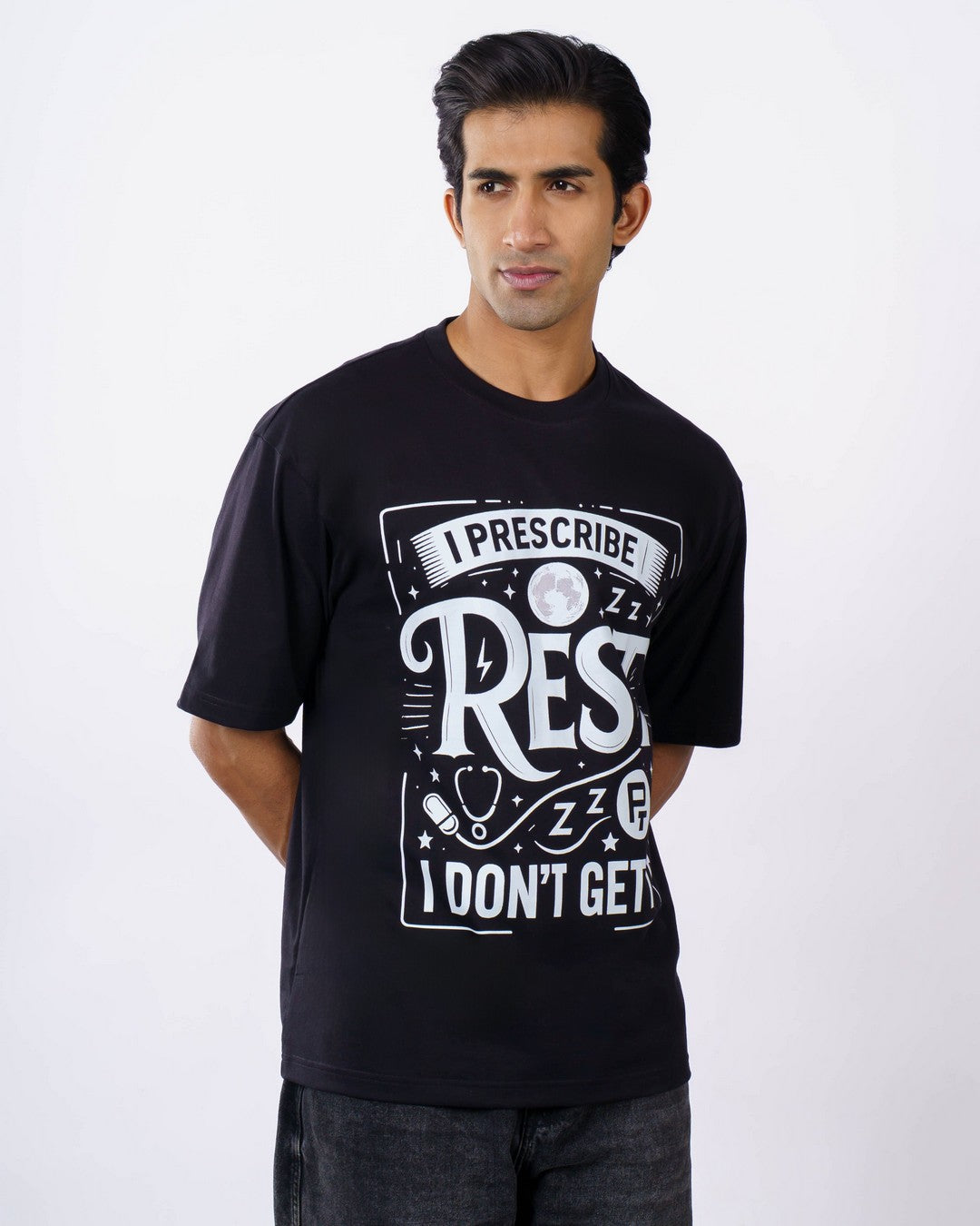 Black oversized fit Quote Tshirt For Men with white graphic text worn by male model 1