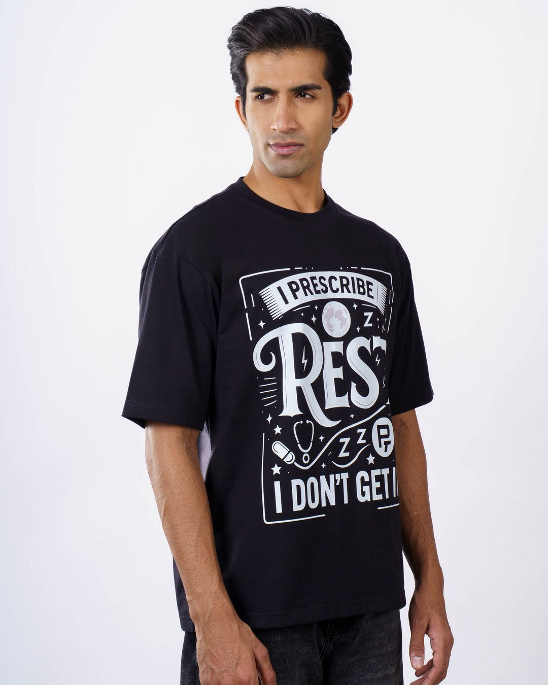 Black oversized fit Quote Tshirt For Men with white graphic text worn by male model 4