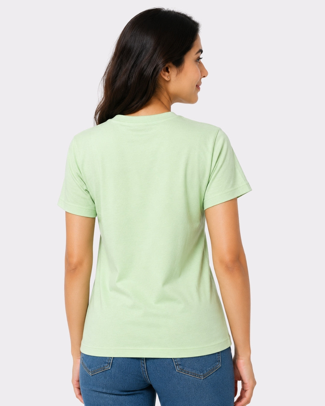 Back view of a woman wearing a Regular Fit T-Shirt for Women Mint Green from Bandar Baant Collections
