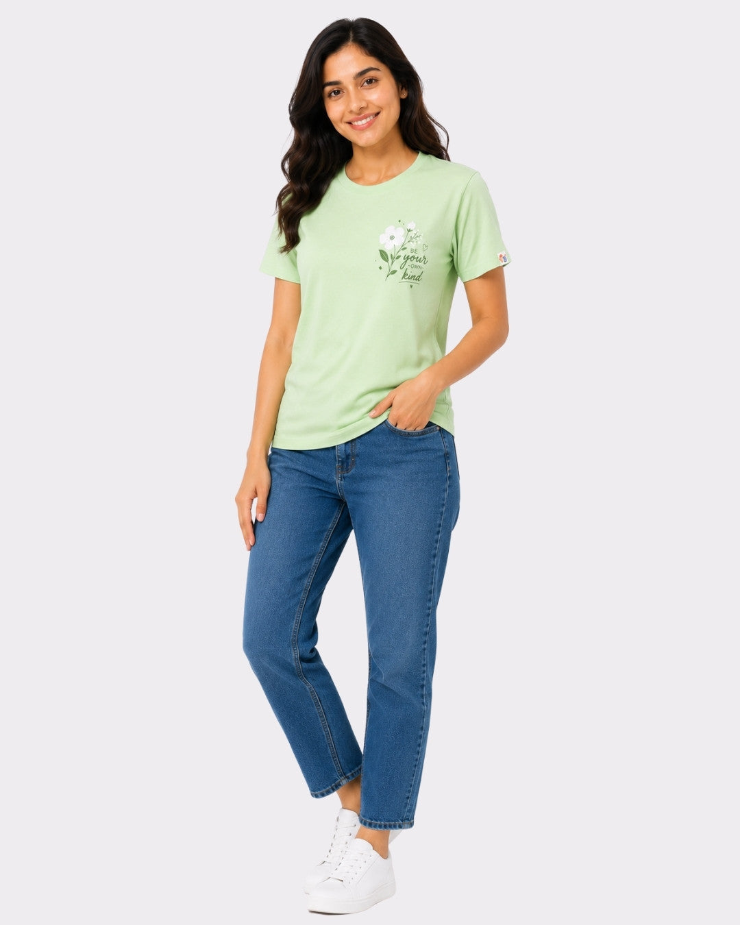 Regular Fit T-Shirt for Women Mint Green from Bandar Baant Collections worn by a smiling woman with blue jeans and white sneakers