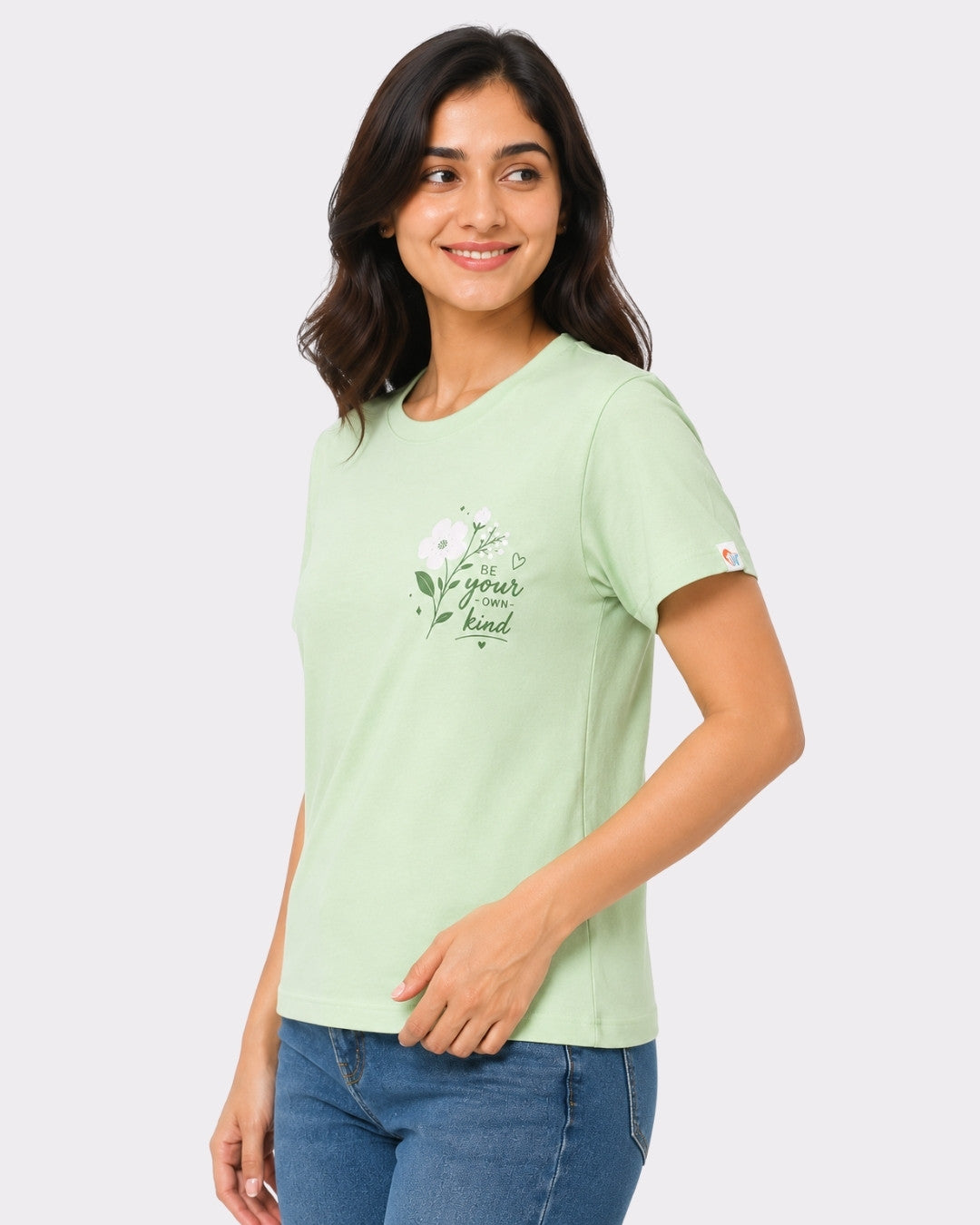 Regular Fit T-Shirt for Women Mint Green with floral print worn by smiling woman in casual jeans