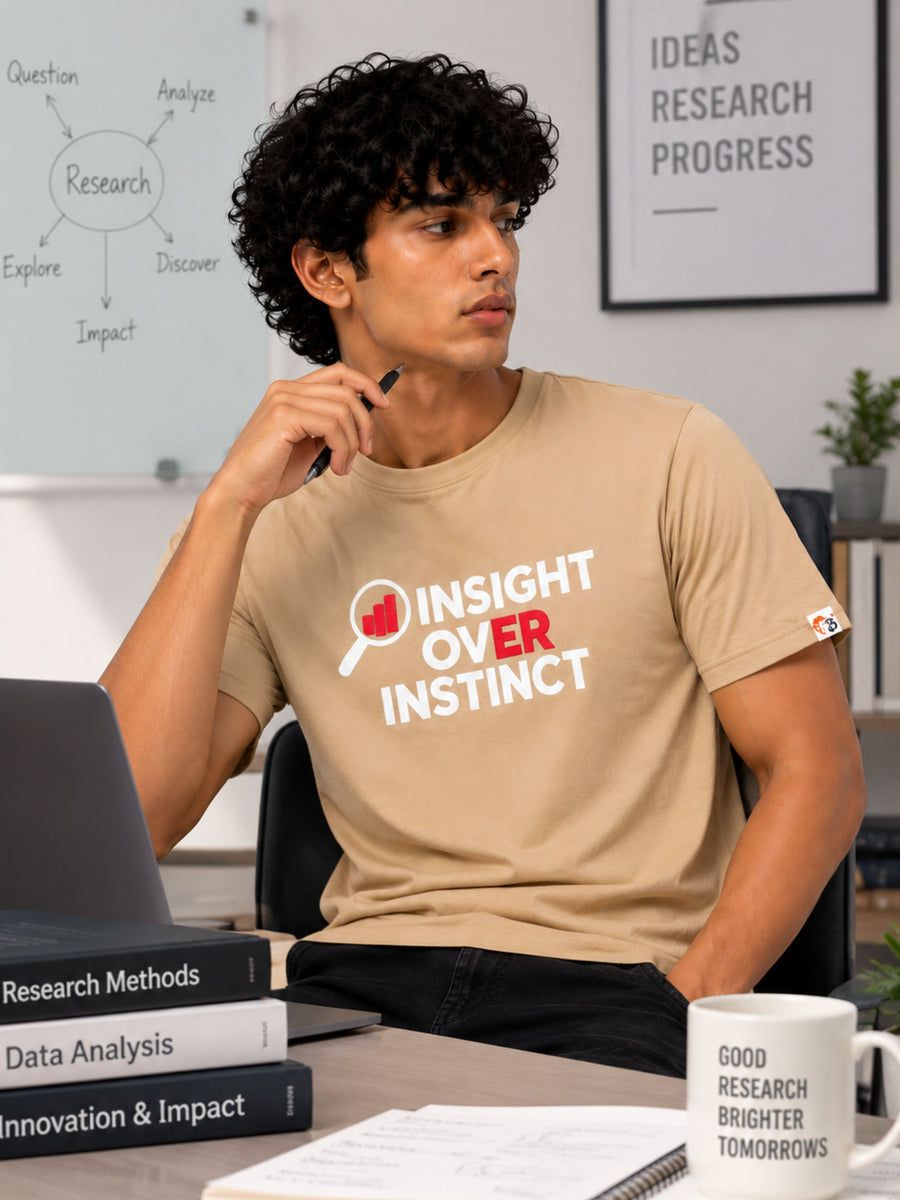 Researchers Regular Fit Tshirt For Men beige with insight over instinct print worn by man in research office