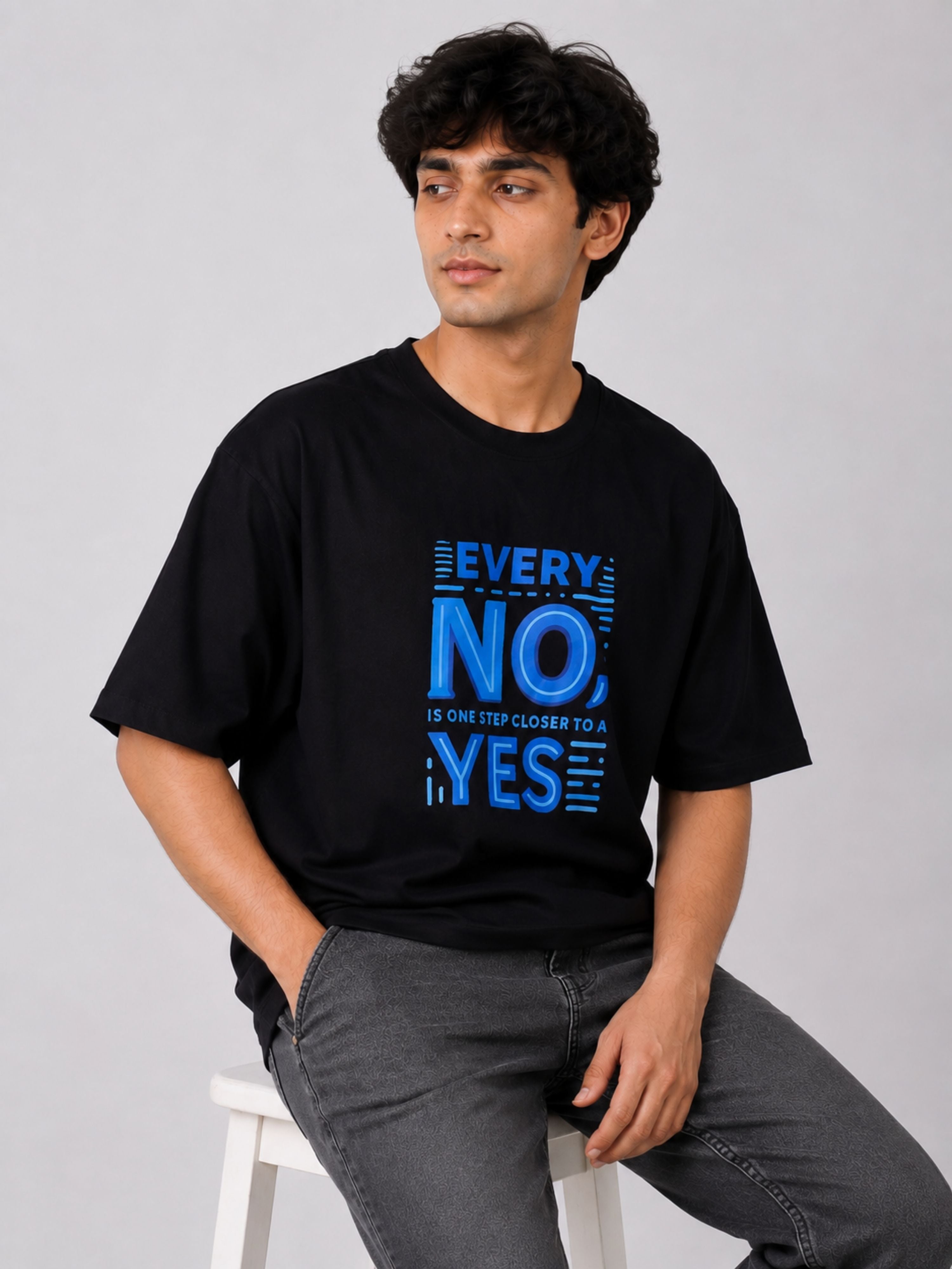 Sales Executive Oversized T-shirt For Men in black with blue text worn by a man from Bandar Baant Collections