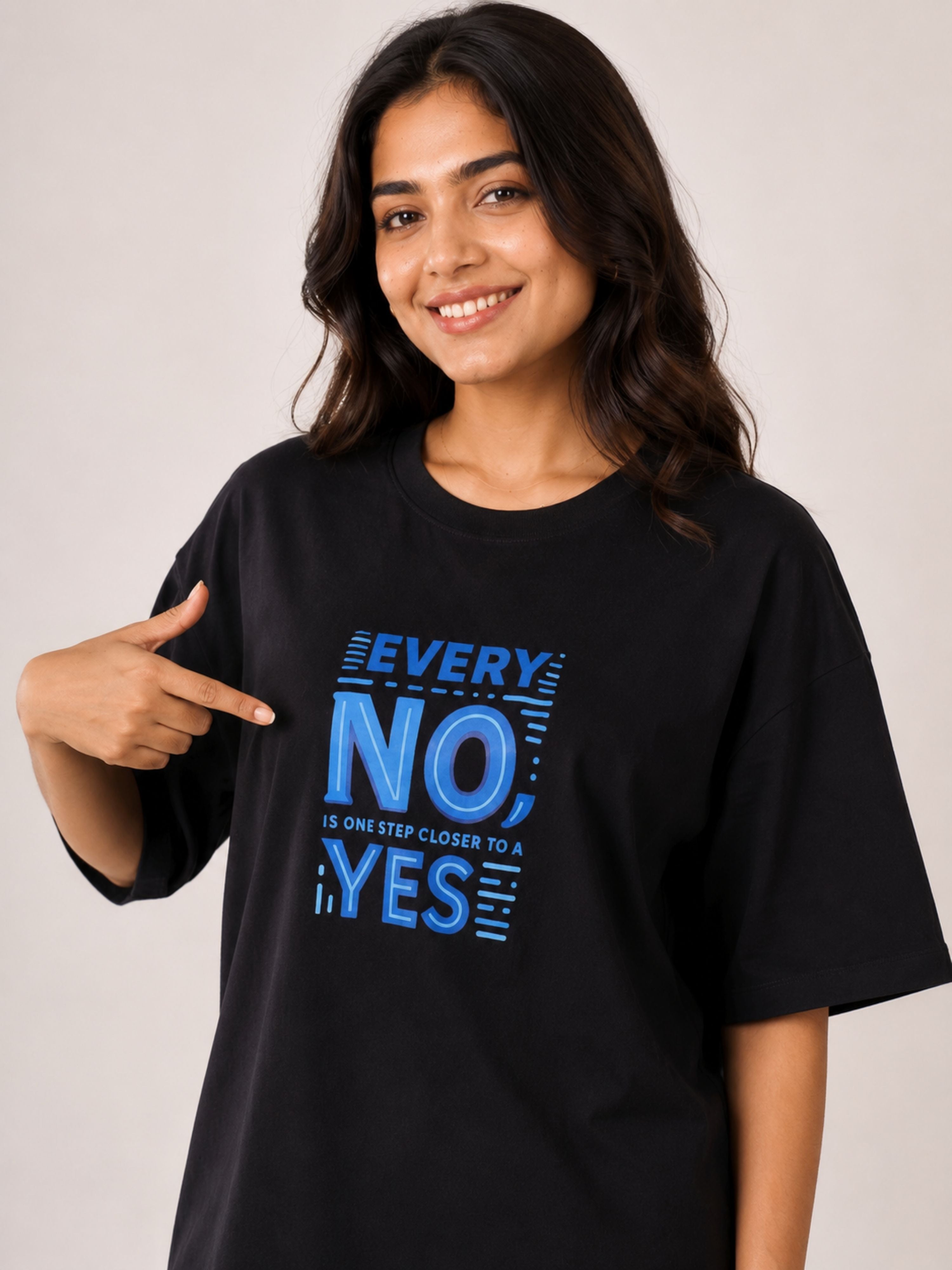 Sales Executive Oversized Tshirt For Women black with blue motivational text worn by smiling woman