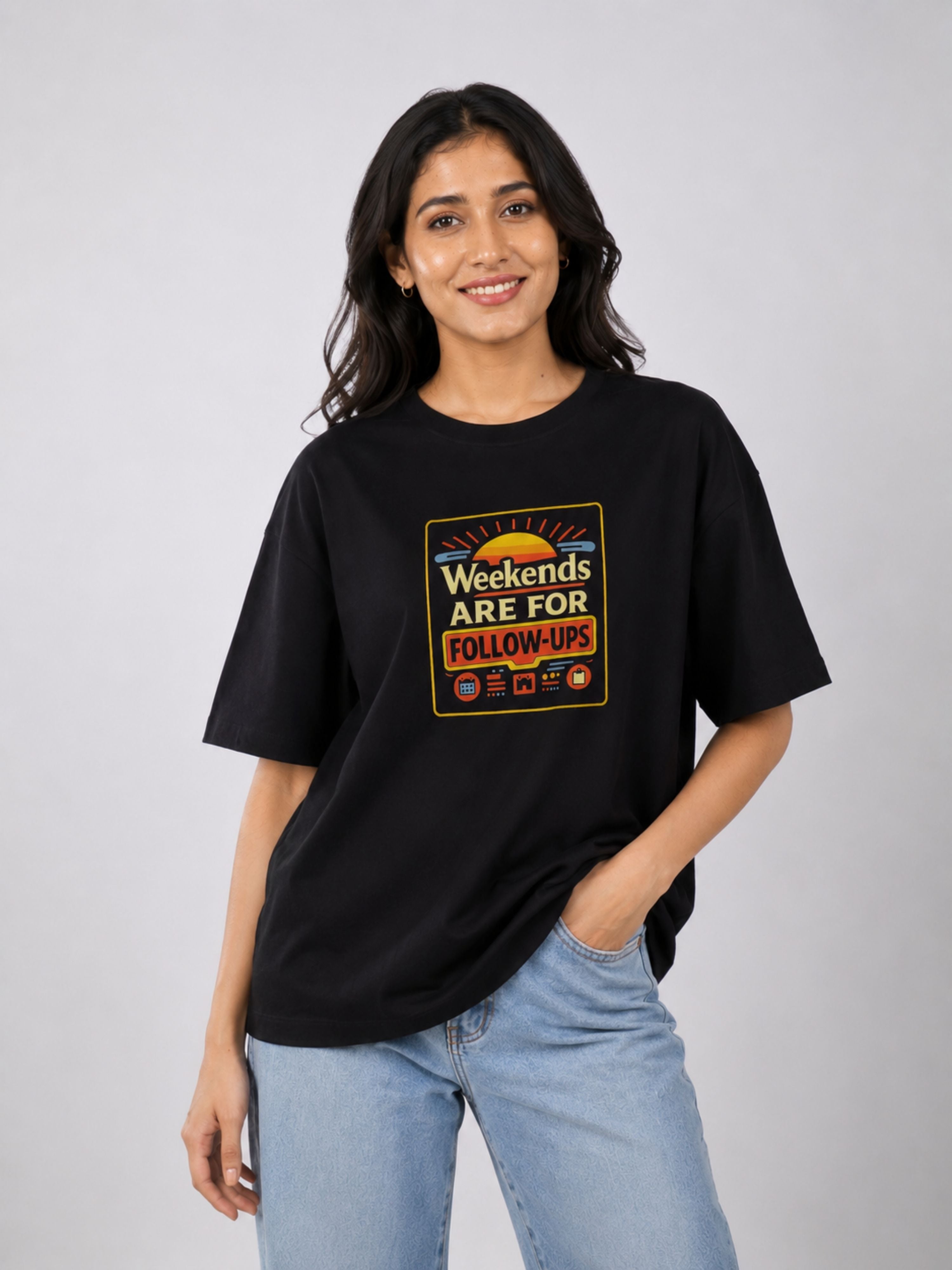Sales Executive Oversized Tshirt For Women black with graphic text worn by smiling model
