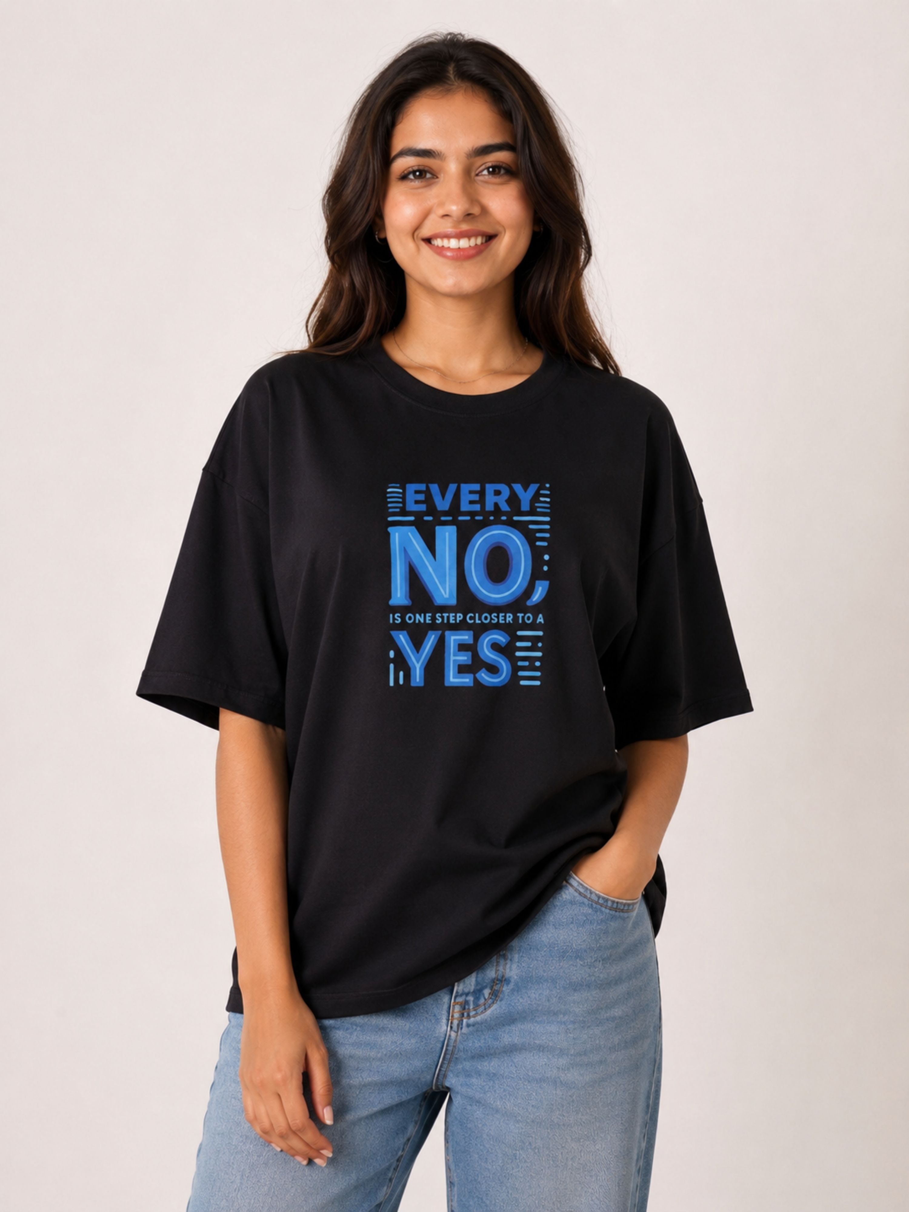 Sales Executive Oversized Tshirt For Women in black with blue motivational text worn by smiling woman