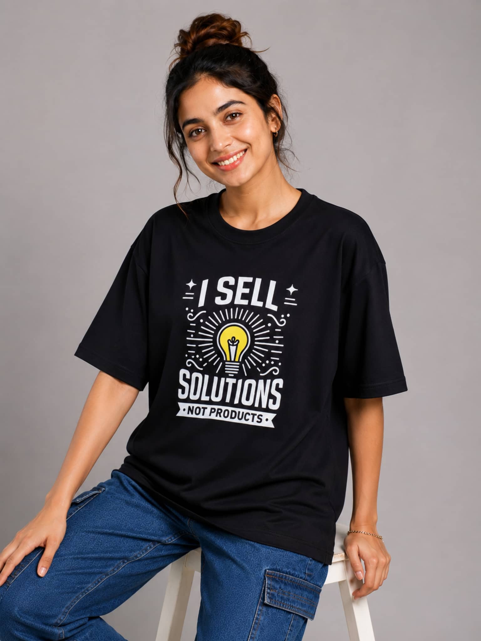 Sales Executive Oversized Tshirt for Women in black with I sell solutions graphic print from Bandar Baant Collections