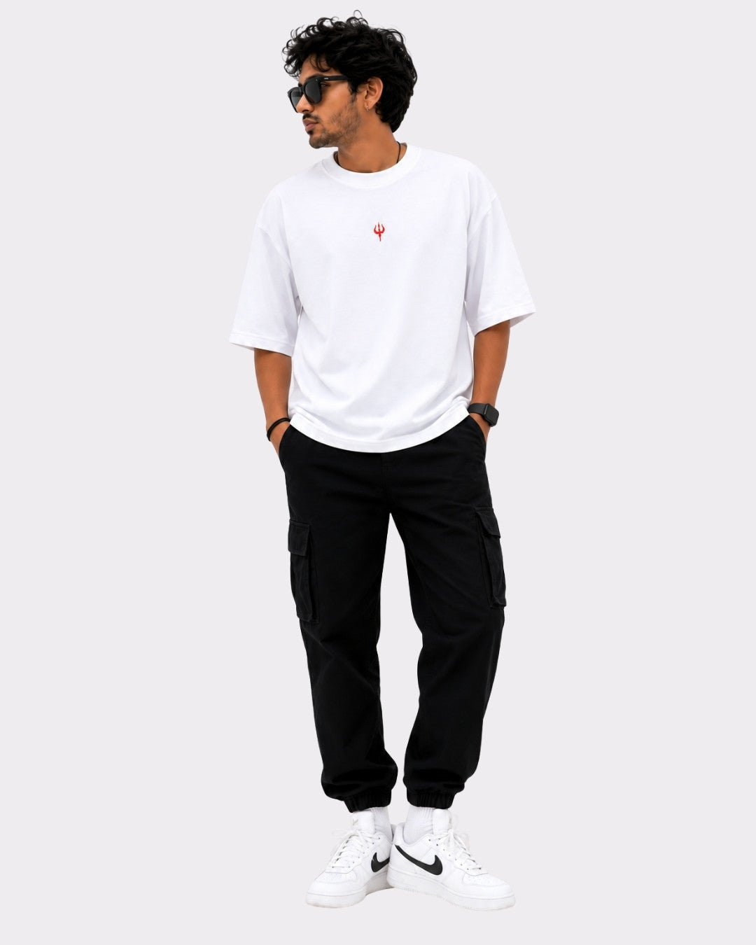 Sanatan Dharma OM NAMAH SHIVAY T-shirt For Men oversized fit white tshirt with small red symbol worn by male model