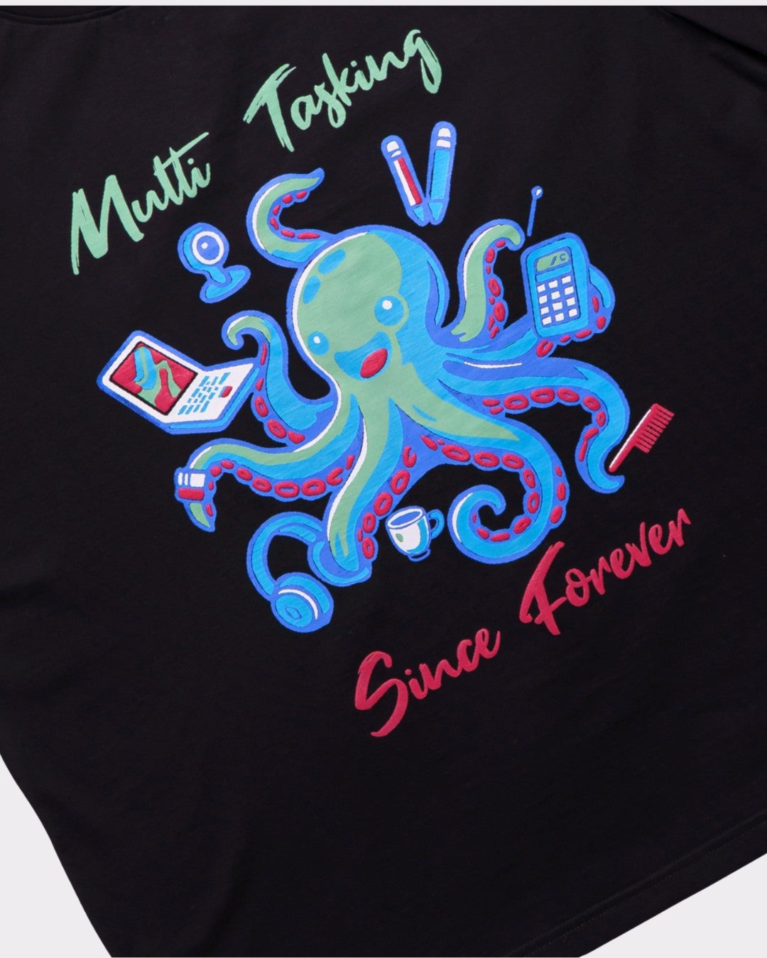 Black oversized T-Shirt For Men featuring colorful multitasking octopus graphic design