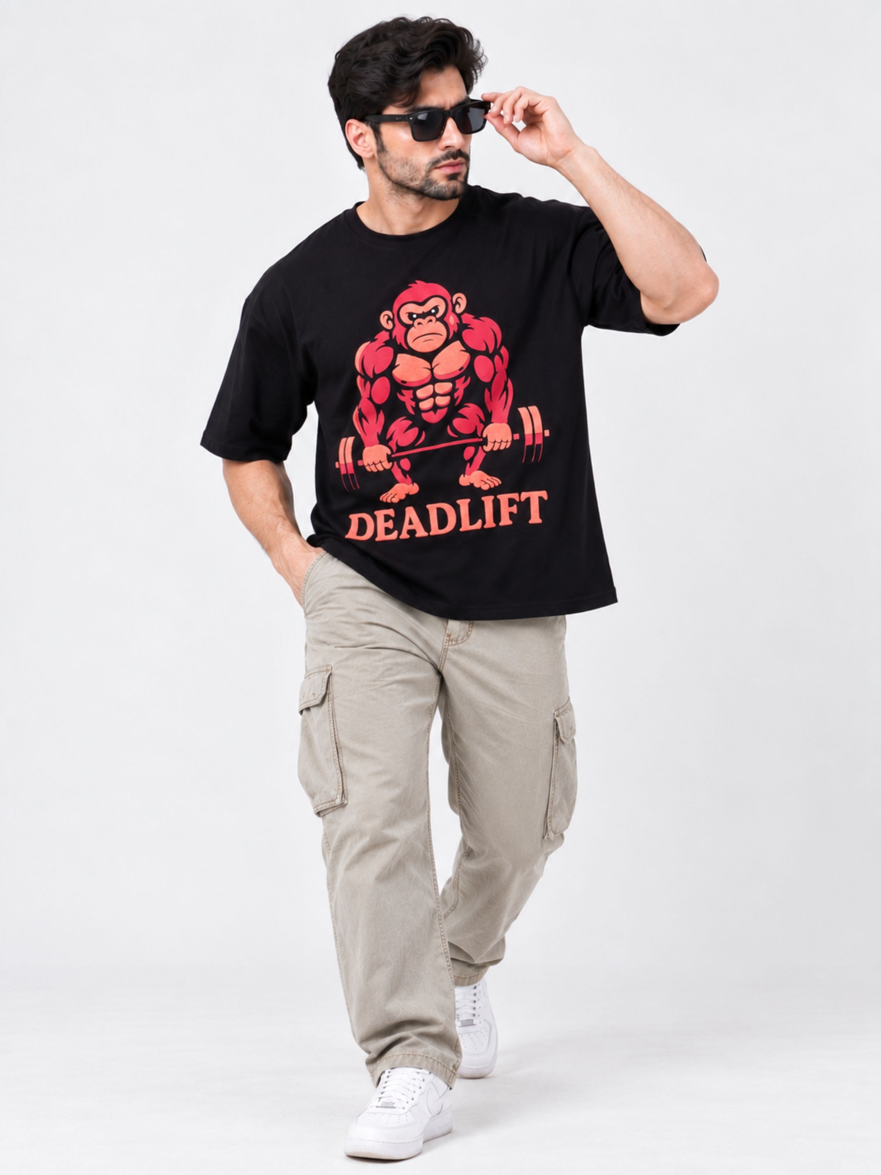 Men's oversized fit Gym Enthusiast Printed T-shirt For Men in black with a red muscular gorilla deadlift design