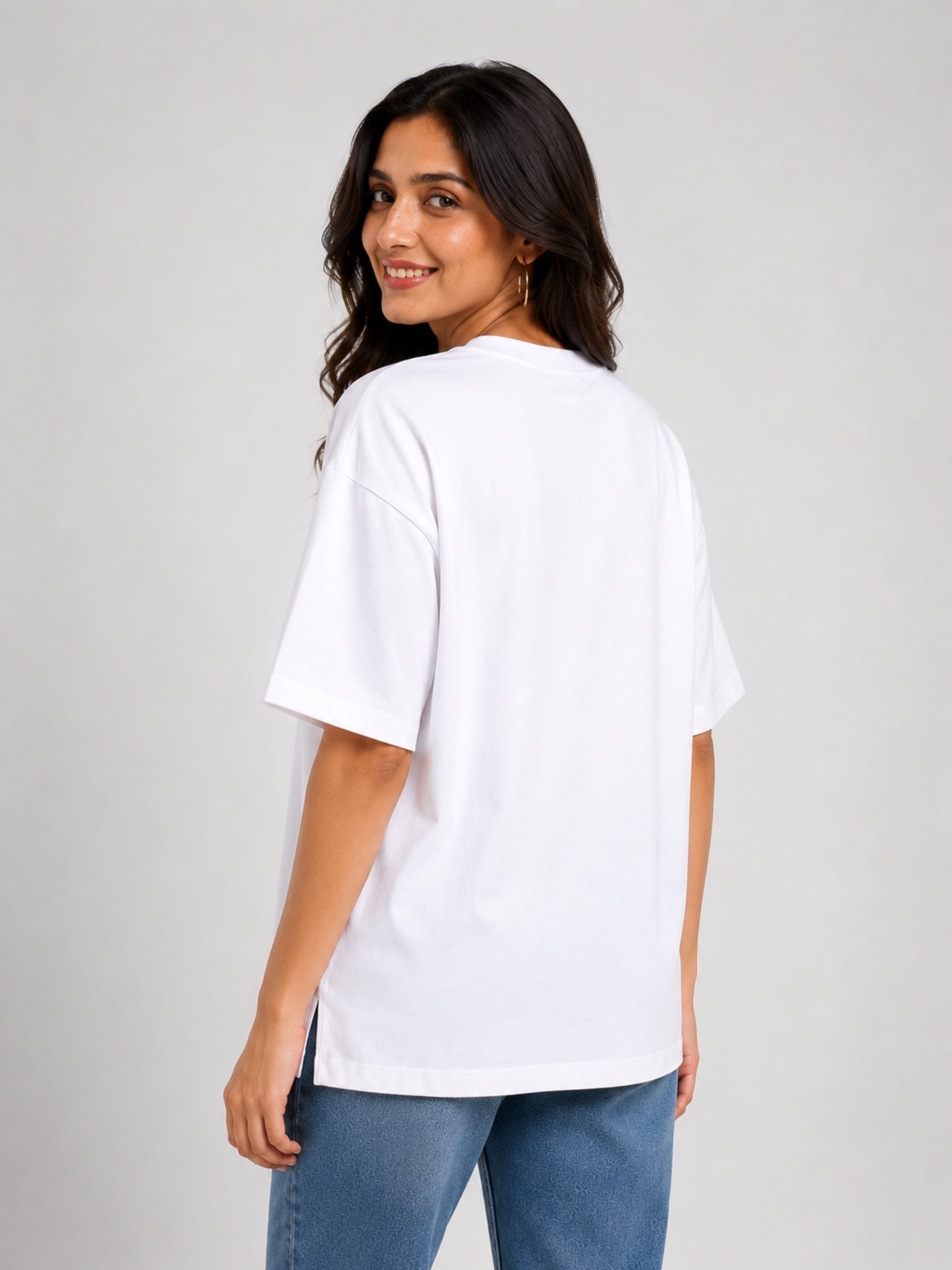 Woman wearing white oversized fit Gynaecologist T-shirt For Women from Bandar Baant Collections