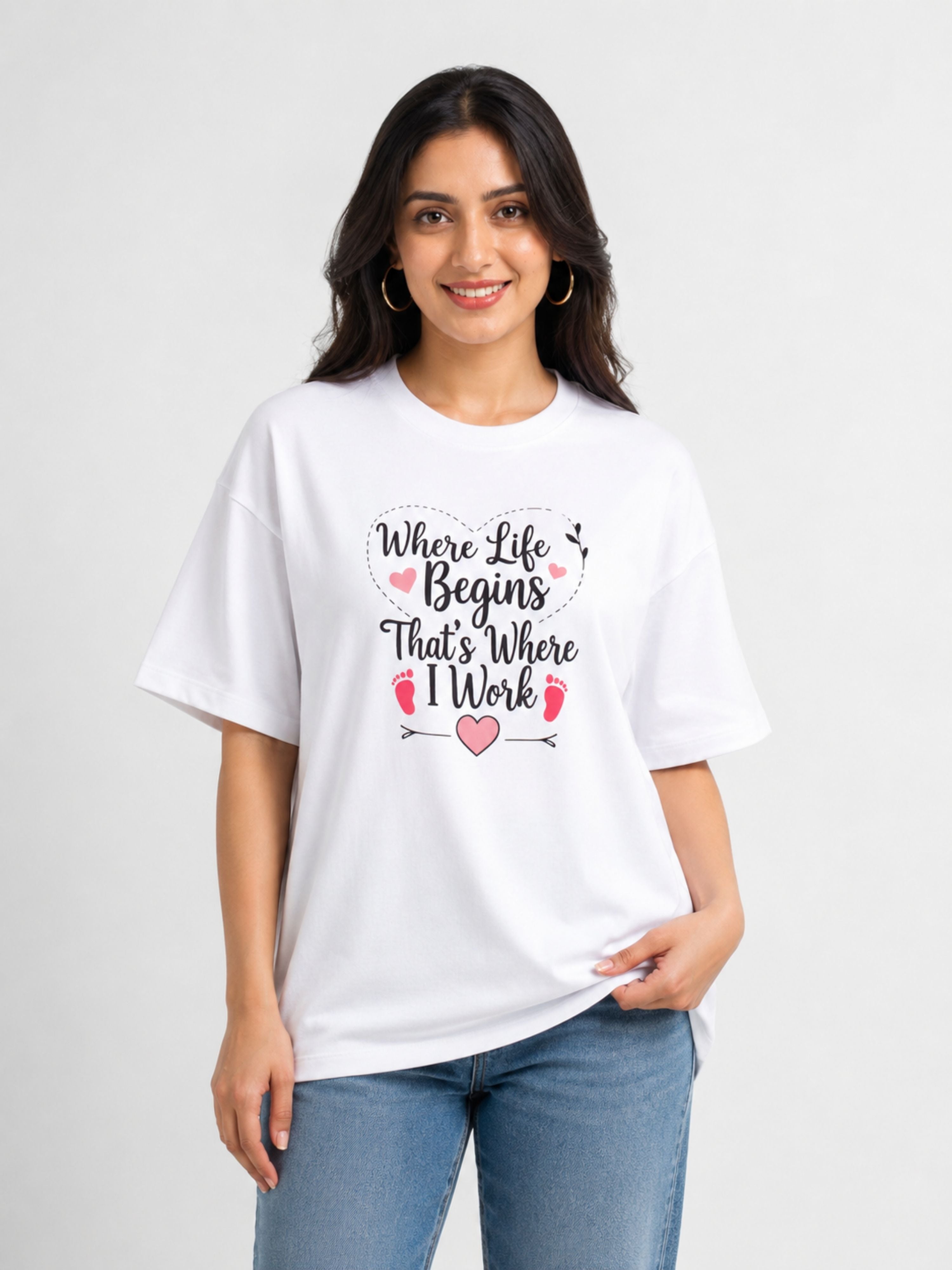 Oversized fit white Gynaecologist T-shirt For Women with 'Where Life Begins That's Where I Work' text