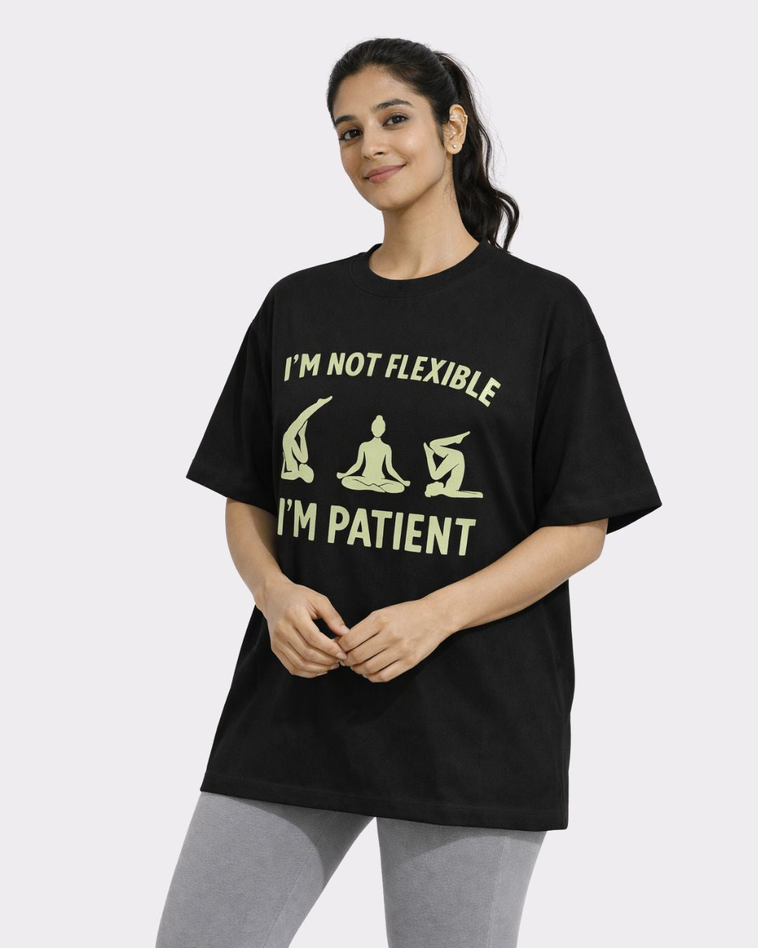 Yoga Instructor Oversized T-shirt For Women in black with I m Not Flexible I m Patient print worn by model