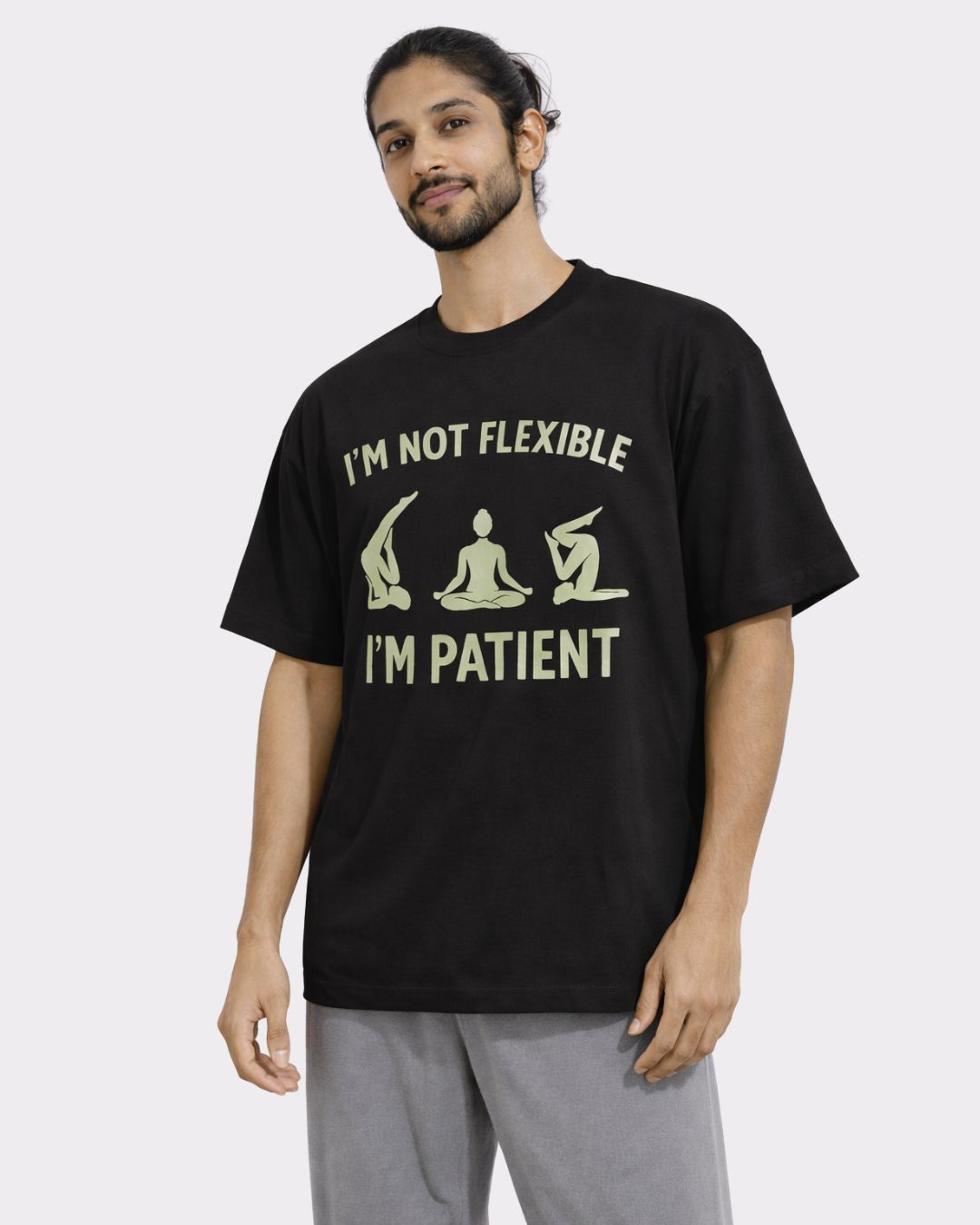 Yoga Oversized Tshirt For Men in black with yoga pose graphic and text I m not flexible I m patient