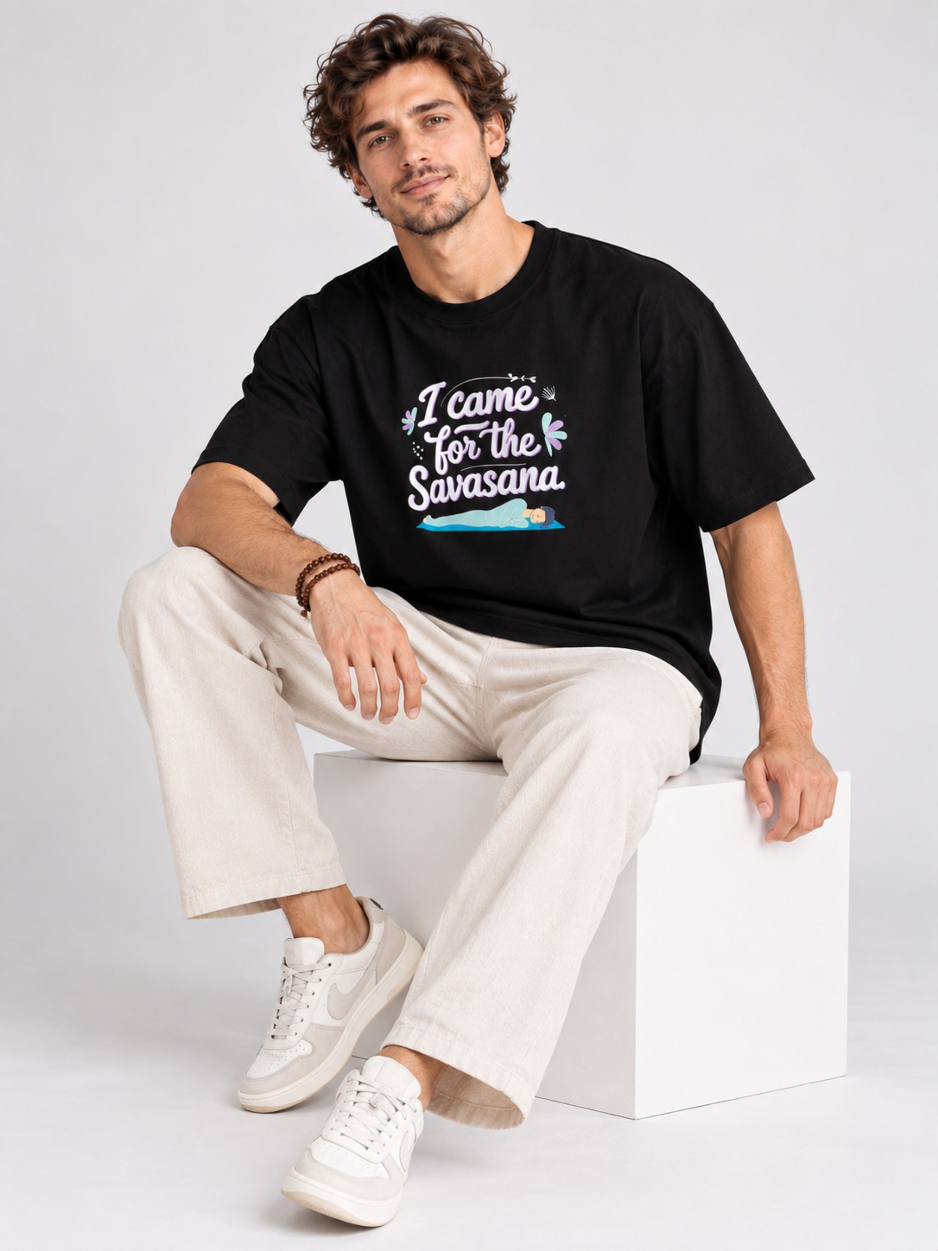 Oversized fit black Yoga Tshirt For Men with I came for the Savasana print worn by model